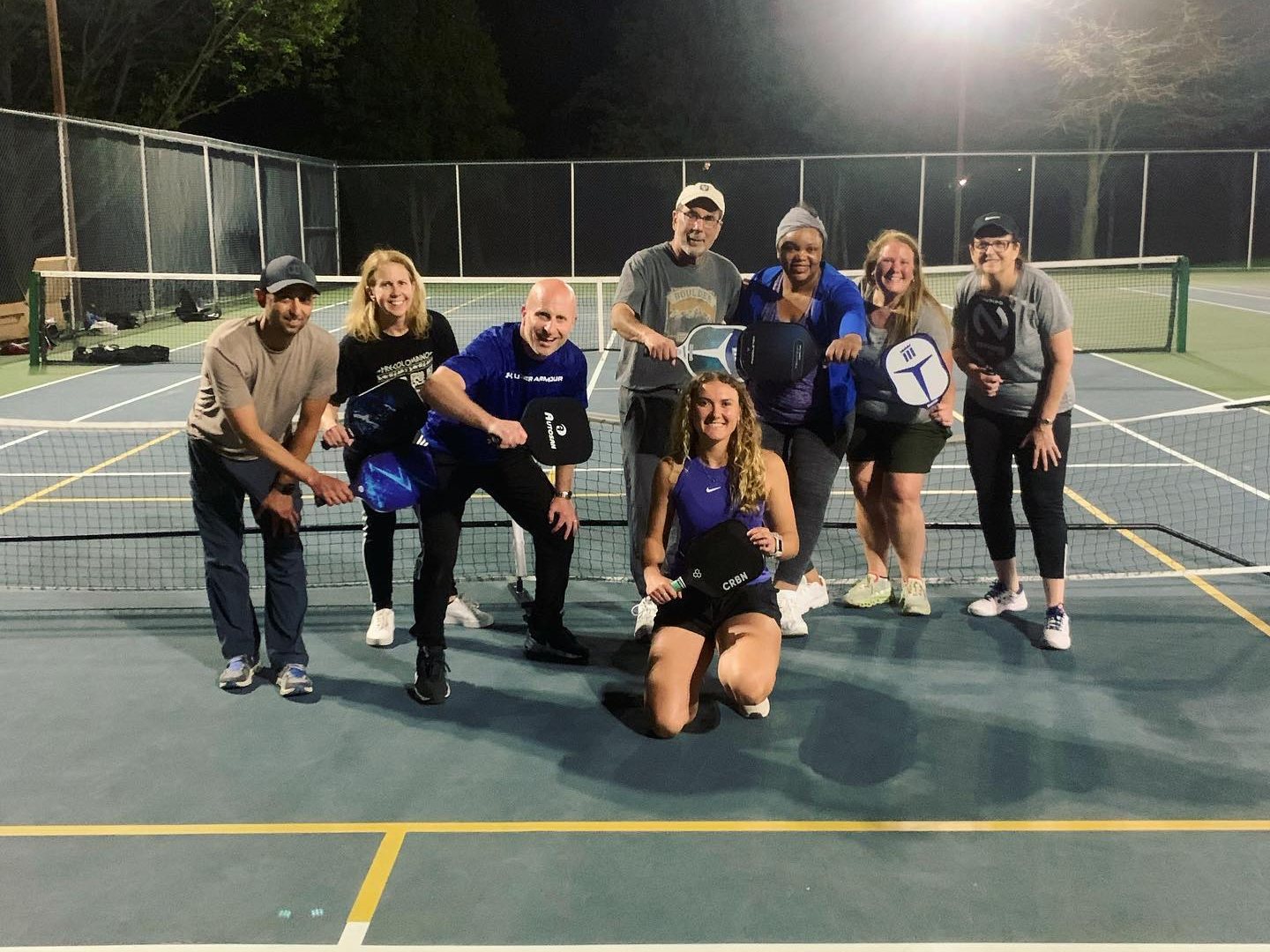 Universal Rackets coaches and players after an evening clinic