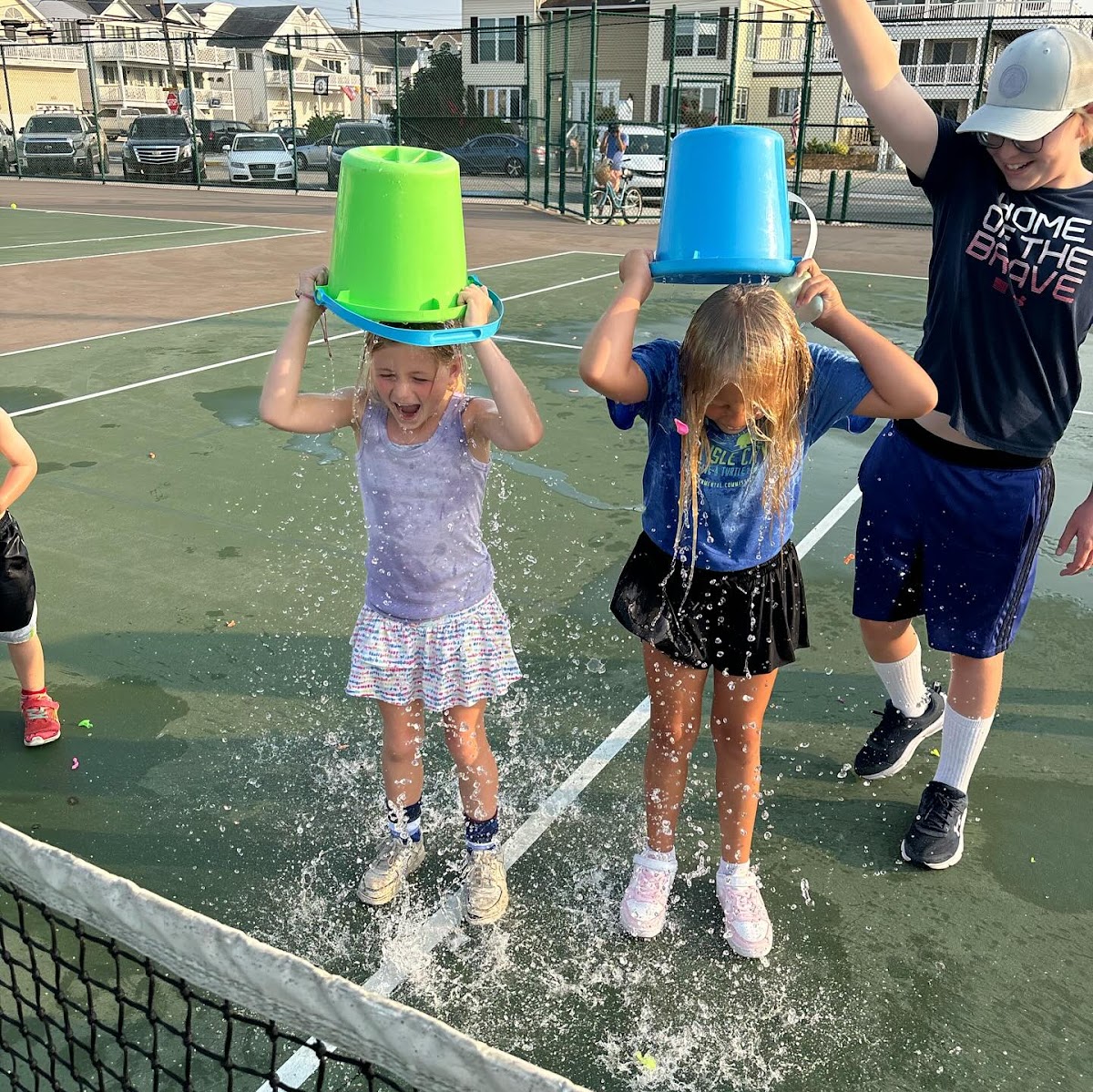 Kids at a Universal Rackets summer tennis camp